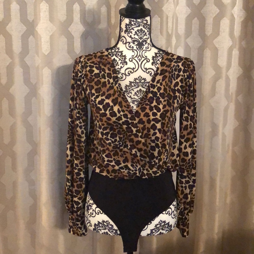 Never worn leopard print one piece